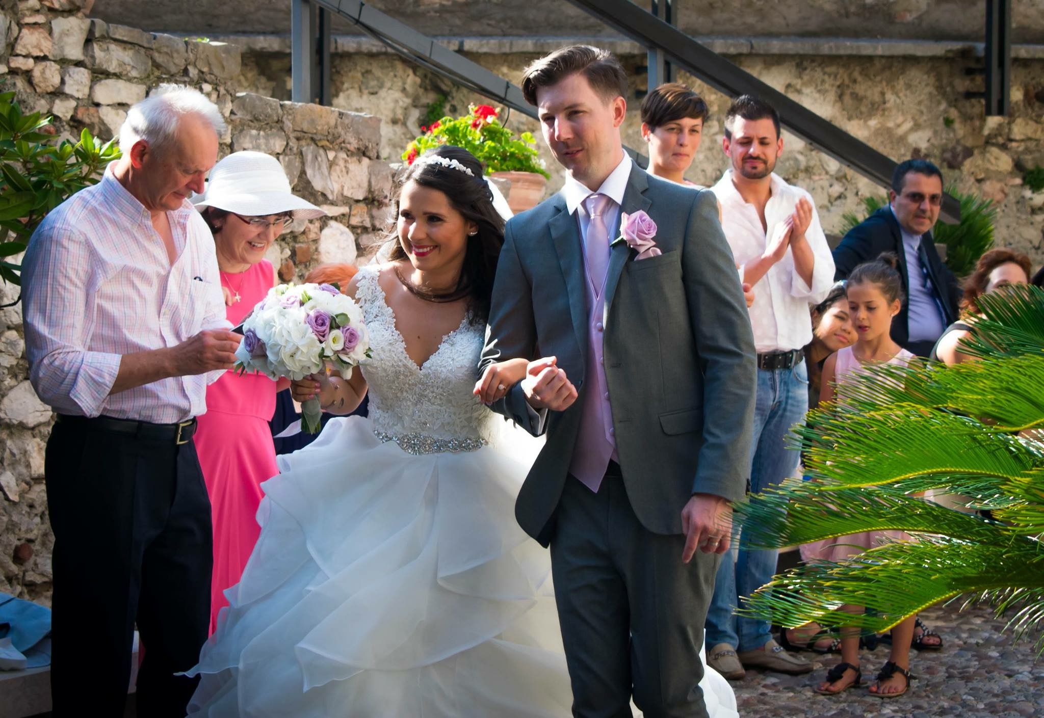 Newlyweds leaving their ceremony